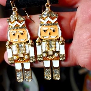 Festive Gold and White Nutcracker Earrings by Sugarfix. Perfect Holiday Gift!